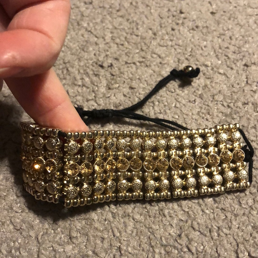 Gold fashion bracelet with stones